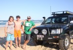 Regular visitors James Sharpe, Bailey and Paul Berriman from Gympie would like to see the beach fees disappear