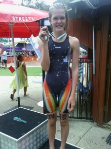 Kiki wins a breaststroke gold