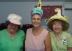 Linda Murphy, Lorraine Bishop and Elwyn Slaughter at an impromptu Easter Bonnet Parade produced quite a variety of headwear - which generated much laughter and cheer!