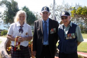 Bugler, Jamie Lee Griffiths, her grandfather Reverend Bruce Dorman and RSL sub-branch executive President Joe Casey led the Vietnam Veteran's Day ceremony