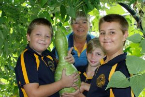 In the living tunnel at Rainbow Beach State School, Mark, Chappy Ronnie, Bailey and Aiden are amazed how the gourd grew over the school holidays! You can tour the kitchen garden and sample a Devonshire tea at an open day this month.