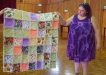 Sue Maddison with her cuddly quilt