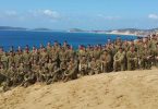 Bravo Company 8/9 RAR assemble on Carlo Sandblow after their 70km of pack marching