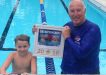 Wyatt Lee has had an awesome winter of swimming with an outstanding effort at Queensland State Championships last month, pictured with Crocs coach, Greg Rogers