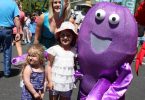 Sadie and Marley Mercieca were happy to have a photo with some of the mascots - Prawn Yvonne Jensen and Octopus