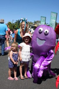 Sadie and Marley Mercieca were happy to have a photo with some of the mascots - Prawn Yvonne Jensen and Octopus