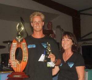 Ryan Cozens is presented with the original Robert Pryde Open Perpetual trophy by Robert's sister, Lyn Hourn