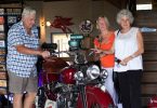 Over 60's - Friends from Probus Don Beaton, Judy Kiddle and Yvonne Denniss with a great red Indian vintage motorbike
