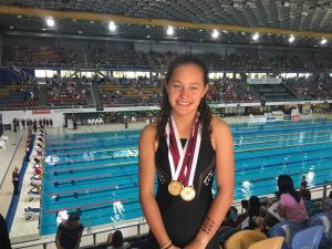 Jasmin White scored a bronze in breaststroke and gold in freestyle in a state wide competition last month