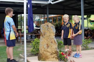 Mark did an admirable job with the flag and watched on as Blake and Zarya laid flowers at the school cenotaph