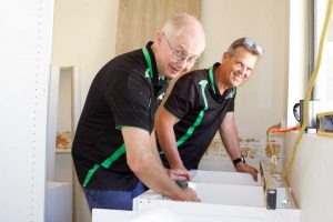 Cooloola Coast Cabinets' Paul Smith and Tim Sheard install a laundry