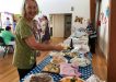 CIRS Treasurer Helen Brown helps out at the charity morning tea last month - and hopes that you may be able to help her?