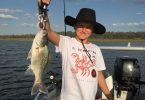 11-year-old, Thomas May, who caught this nice bass whilst on a club outing at Boondooma Dam recently