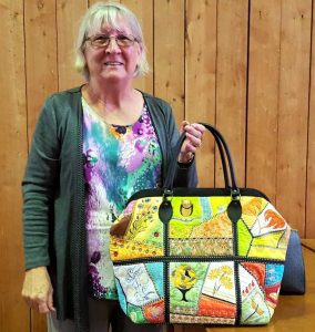 June Fraser made an overnight bag made with small pieces of fabric in a design called ‘crazy patch’ with machine embroidery 
