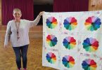 Linda Pottle with a Dresden Plate quilt