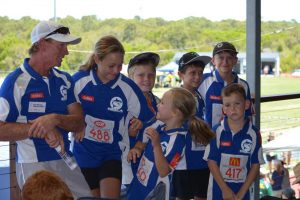 Little Athletics - The Cooloola Coast Team has a playful laugh before competition begins