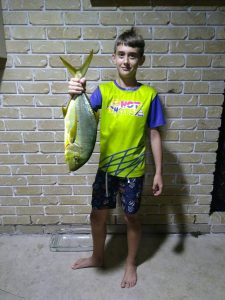 Caleb Jensen was absolutely thrilled with his new rod and he caught a GT off the Tin Can Bay jetty, weighing just over 2kg - he thanks the club for hosting the Sunfish Junior fishing day