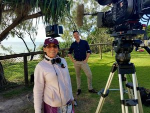 Andrew Hawkins is a natural in front of the camera, pictured ‘working it’ with Producer Anita whilst filming House Hunters International in Rainbow Beach