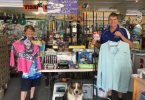 terri and Bruce from Rainbow Beach Hardware, Fishing and Camping show off some of their Christmas Specials
