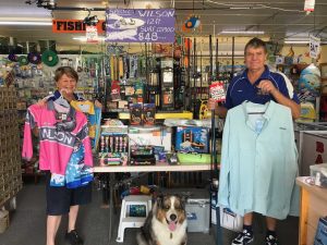 terri and Bruce from Rainbow Beach Hardware, Fishing and Camping show off some of their Christmas Specials