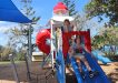 Reuben and Max O'Brien from Maryborough try out the new play equipment at Phil Rogers Park