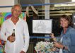Grant and Kathy McFarlane with Kathy’s ARTYball sketch of Grant’s Lionfish
