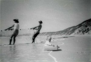 Net fishing on the beach with a young Tony Dean in the foreground – 1960’s