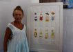 Yvonne Connelly with ‘The Walking Lady’, the highly prized piece found a home at Rainbow Getaway Holiday Apartments