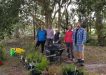 L-R Jess Milne (Weed Warriors Team Leader), Linda Tabe (Vice President), Julie Venn, Ferne Tabe, and Rod Hutchinson preparing the tools and plants ready for planting by Ben Galea