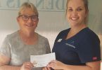 Health Coloured Sands Clinic - Gemma with a donation for the RSL