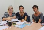 The new Rainbow Beach Community Centre committee are Secretary Rose Mayes, on the left, President Elisa Saul, centre, and Treasurer Kirstie Jordison, on the right