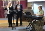 Debbie, Len and Pam playing the theme song from the film Titanic: My heart will go on, with flute, tenor recorder and piano