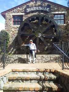 A worn-out Probian (John Olson) leaning up against the fence in front of the Montrose Waterwheel at Montville during a recent excursion 