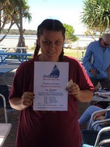 Ella Beauchamp with her Certificate of Achievement from Sailability at Tin Can Bay 