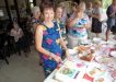 Madonna Hope cutting the Suriname cake at the 2019 World Day of Prayer with Jeanette Murray, one of the organisers for the 2020 Service, and Eveline Crase
