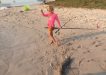 Elora, grand-daughter of club member, Jane Potter, on a recent holiday in Tin Can Bay learns how to fish
