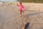 Elora, grand-daughter of club member, Jane Potter, on a recent holiday in Tin Can Bay learns how to fish