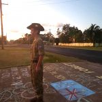 Cadet Sergeant Lachlan Jensen, age 16 of the Gympie Army Cadets honoured Anzac Day in his driveway in Cooloola Cove
