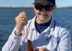 Fishing - Chandlery - Emma Rippon from The Chandlery catching a feed of squid for the family