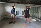 Carlie Farlow and Travis Buchanan from DRM constructions working on the Rainbow Beach Surf Club renovations