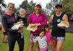 The Rainbow Beach Trail Festival women's half marathon winners Elly Marie, Michelle Bremer and Lauren Ormsby, who were met after the race by their children