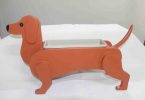 One of the products available for sale from the Men’s Shed is Fernando’s life size Dachshund planter box