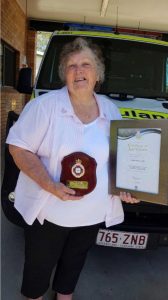 Former president, Lillian Clark, was presented with an award from the Queensland Ambulance Service recognising her 44 years of service