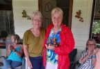 Cooloola Dragon Boat’s Head Coach, Sandra Wooster, presents Coach's award trophy to Assistant Coach, Helen Hurworth