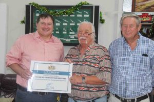 Shed Patron, Llew O’Brien, presenting Shed Manager Bryan Phillips and President Rob Jones, with the certificate through the National Shed Development Program