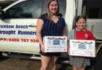 Droughtrunners - Paige and Mia Reibel with a couple of the 40 boxes of prawns donated by Reibels Fishery
