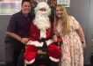 Tin Can Bay Country Club Manager Brad Robb and his wife, Heather, helped Santa Claus this year, and they thank everyone who bought a ticket in the raffle