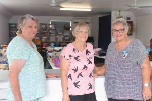 Yvonne, Brenda and Judy sell goods at last month’s CWA garage sale