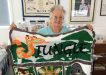 Mollie with her crocheted jungle theme rug, her entry in the QCWA Knitting Competition