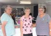 Yvonne, Brenda and Judy sell goods at last month’s CWA garage sale